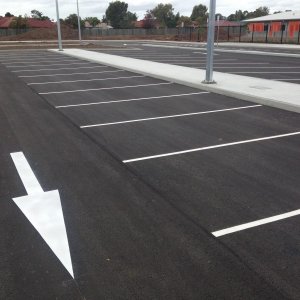 Directional arrows and car park line marking